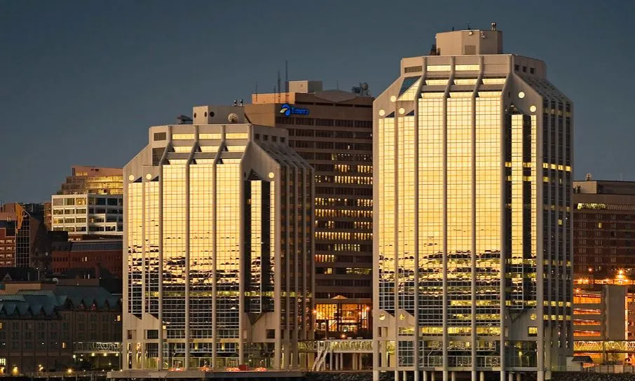 Purdy’s Wharf towers on the Halifax waterfront at dusk, home of UBU Financial’s Canadian office